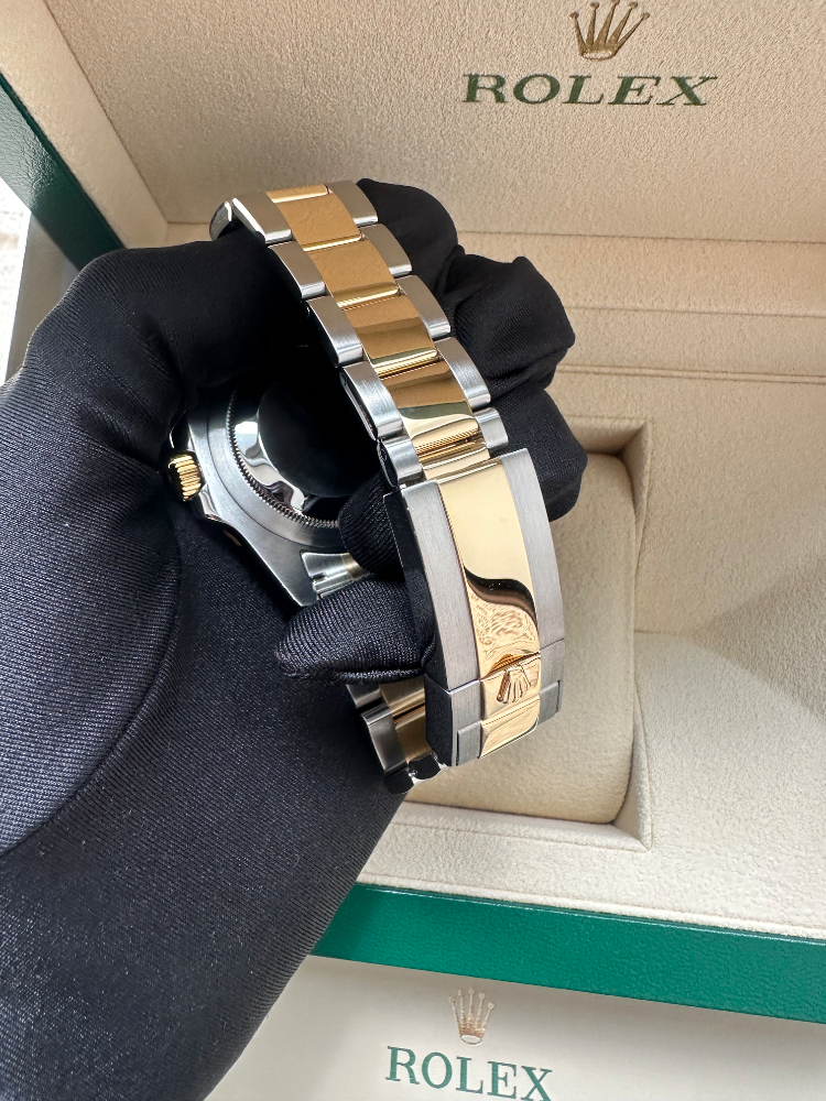 Часы Rolex GMT Master II 40mm Steel and Yellow Gold 116713LN